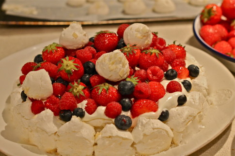 French meringue cake with mascarpone vanilla cream and summer berries
