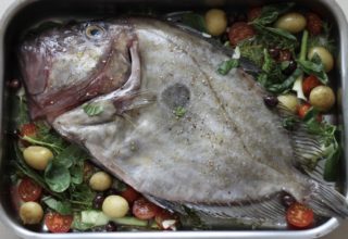 John Dory with tomato, olives and herbs